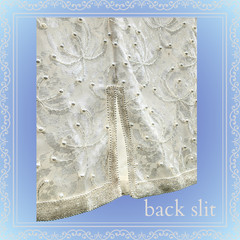 medium mid-length vintage hand beaded ivory Scala wedding dress