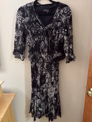 Vintage Lily Black And White Floral Dress With Ruffle Hem And Matching Jacket