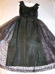 Vtg 1950’s Little Black Dress. Sheath with removable lace skirt. Waist 23″.