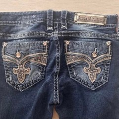 Rock Revival navy bootcut jeans with rhinestone details. Size: 25″