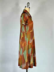 Vintage 1970’s lightweight nylon knit earth tone abstract print day dress Medium