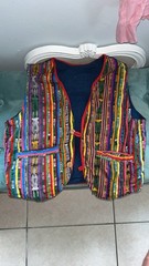 Vintage Guatemalan vest with hand-woven colorful stripes and pockets