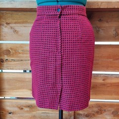 Vintage red, pink, and black houndstooth skirt with zipper and button closure.