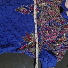 Vintage 100% pure silk blue fully beaded dress.